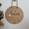 Placa circular con datos natalicios